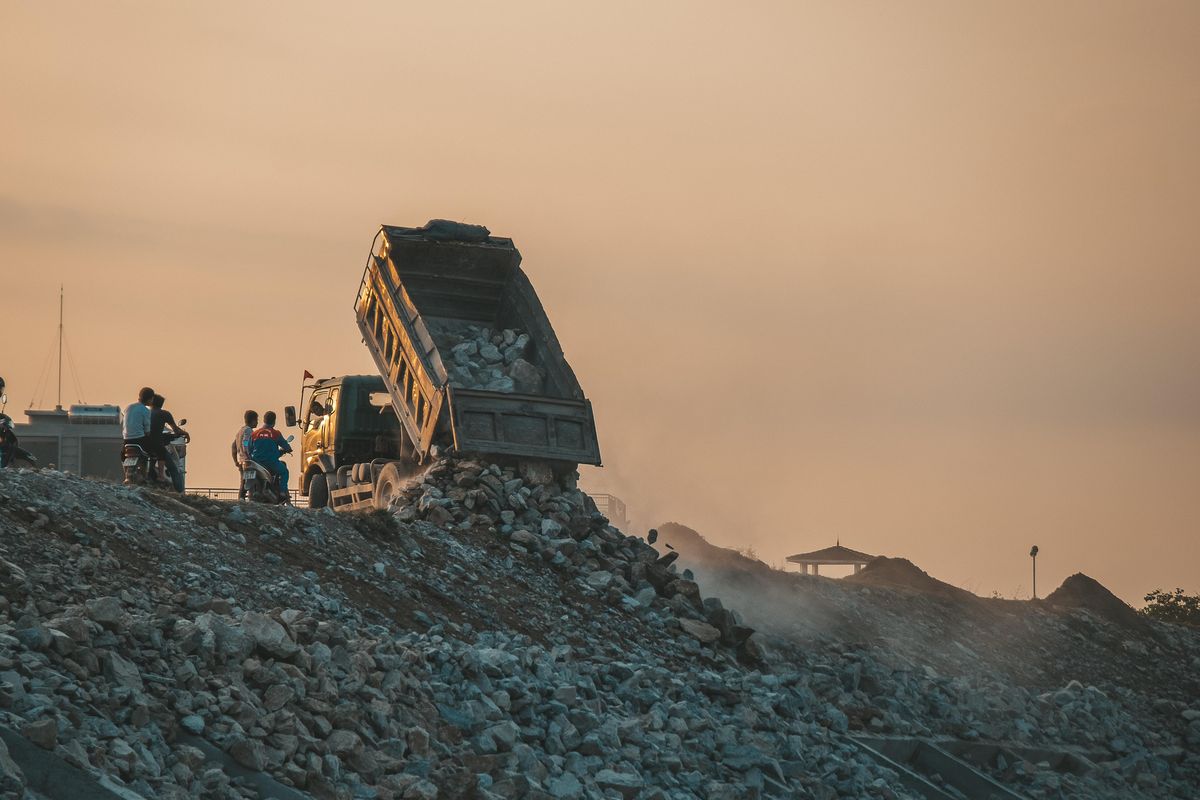 Rubble removal truck at a disposal site